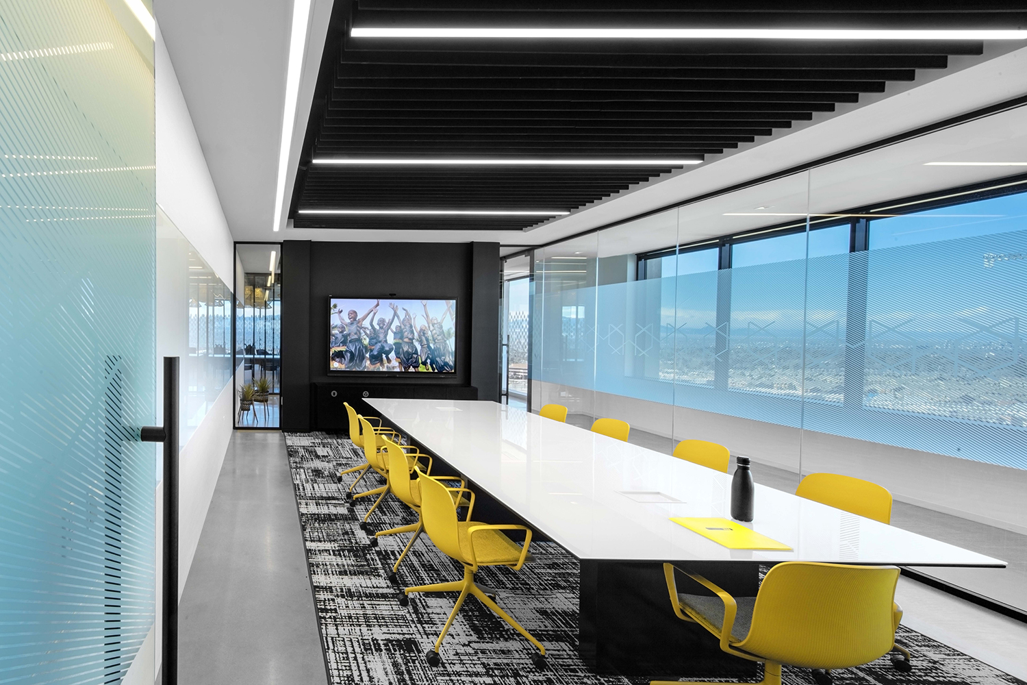 Preview of Flow | Conference Table & Credenza | White Gloss Glass Top (table) | Onyx Veneer Rectangle Base (table) | Onyx Veneer Case  | Black Powdercoat Blade Base  | Western Union | Photography: Eric Laignel