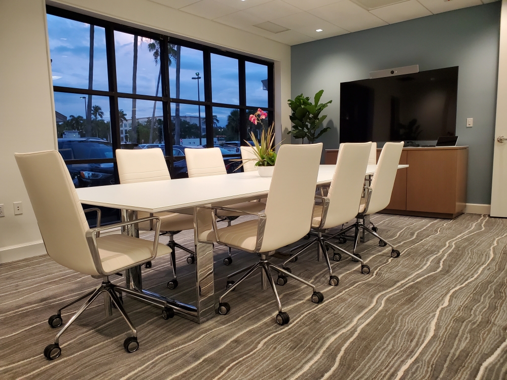 Preview of Flow | Conference Table | White Glass Top | Polished Chrome Hoop Base | Performance Credenza | Veneer Case