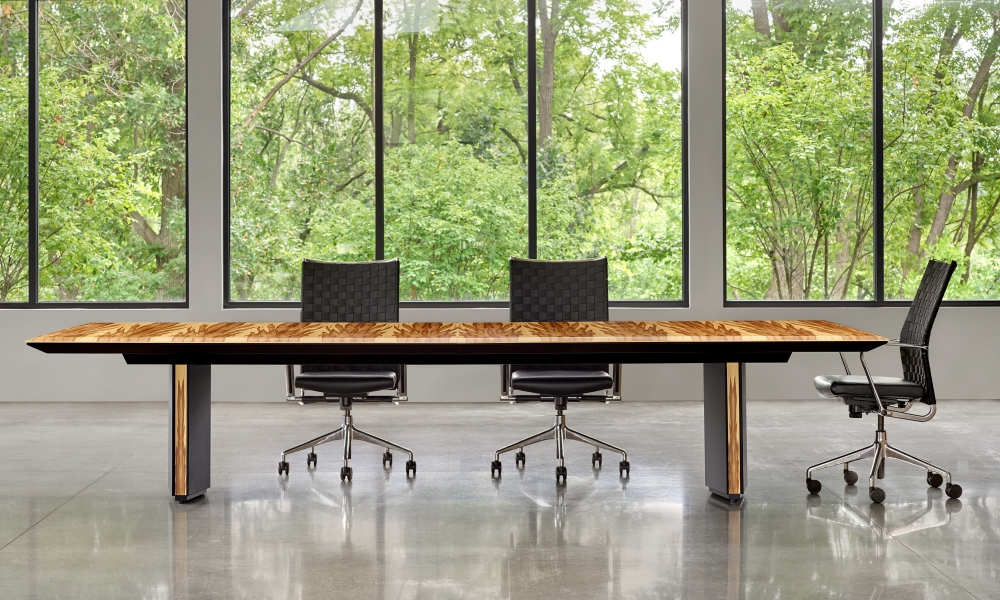 Preview of Ascari Conference  | Rectangle COM Red Gum Veneer Top | Black Brisa Ultrafabrics Wrapped Panel Bases with Red Gum Veneer Reveal | With Chairs