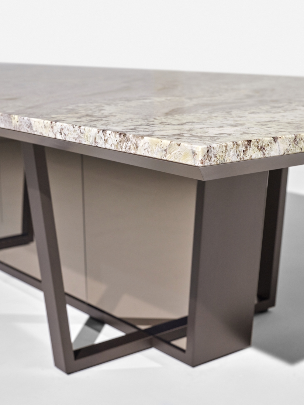 Preview of Crossbeam | Conference Table | COM Stone | Aged Bronze Base | Bronze Mirrored Acrylic | Side View Detail