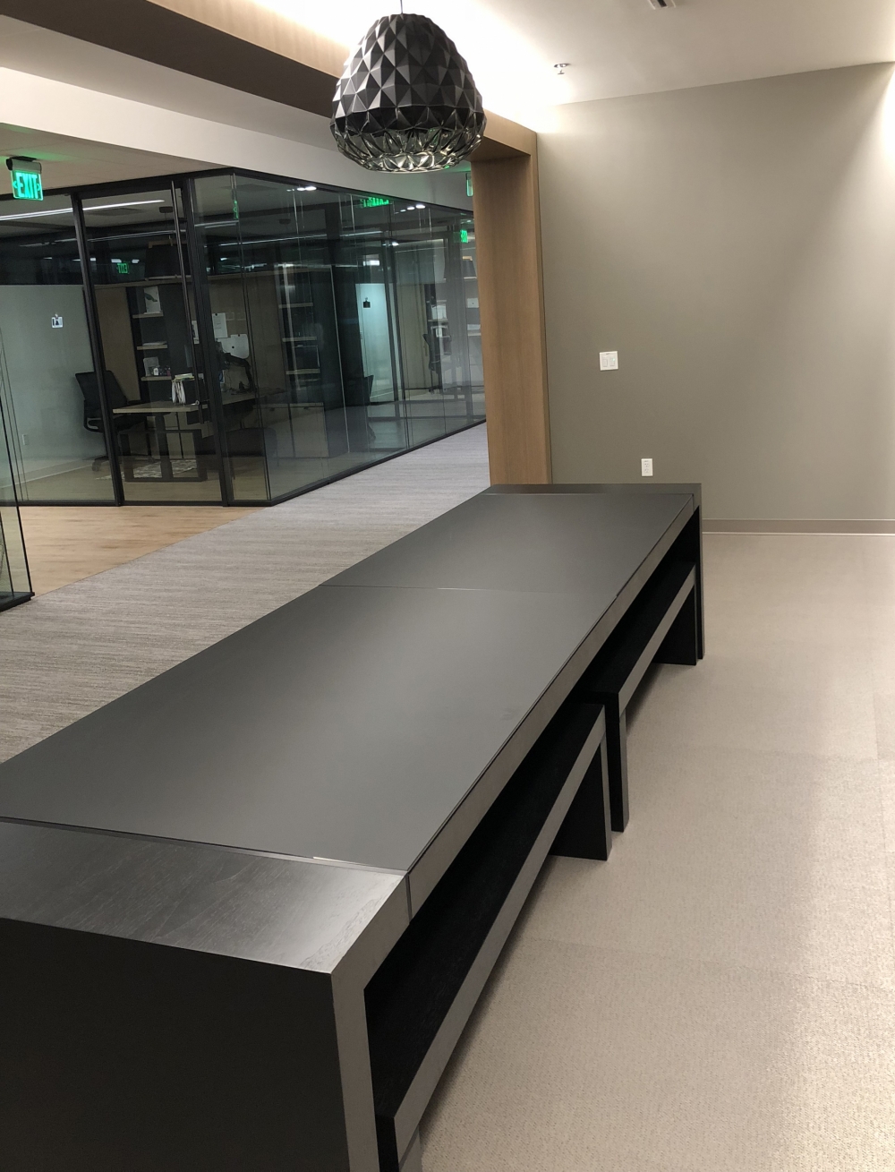 Preview of Tesano | Community Table | G82 Onyx Walnut Veneer | Satin Black Backpainted Glass | Seated Height with Benches