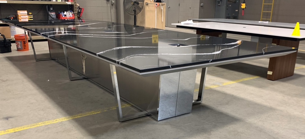 Preview of Crossbeam | Conference Table | Custom Black Quartz Top | Polished Chrome Base | Chemetal Base Panels | 2 Spines | Manufacturing