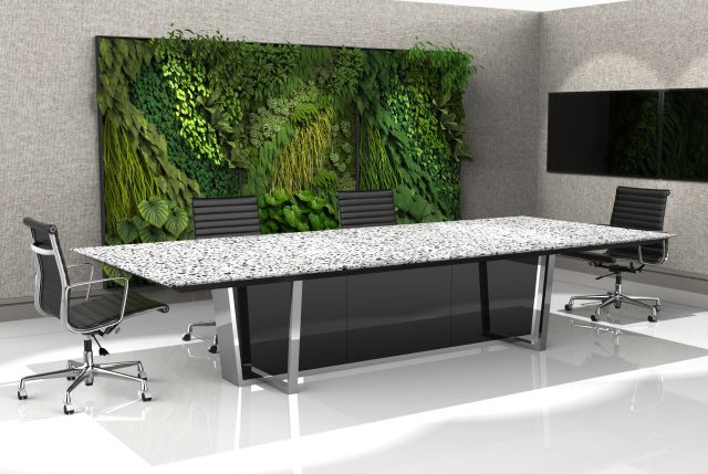 Crossbeam | Conference Table | COM Stone Top | Polished Chrome Base | Mirror Acrylic Base Panels | Living Wall